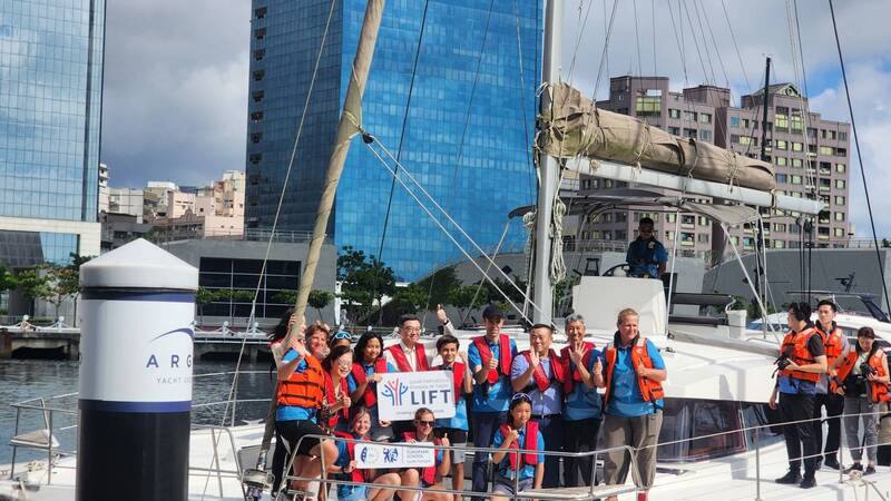 Premier Cho Jung-tai (卓榮泰, third in back) welcomes a group of Taiwanese and international students on Saturday after two vessels completed a six-day sailing trip from Tamsui in northern Taiwan to Kaohsiung in the south. CNA photo May 24, 2025
