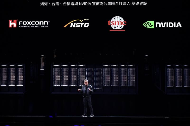 Nvidia Corp. CEO Jensen Huang announces "Beitou Shilin" as his company's new Taiwan office at a Computex keynote speech on Monday. CNA photo May 19, 2025