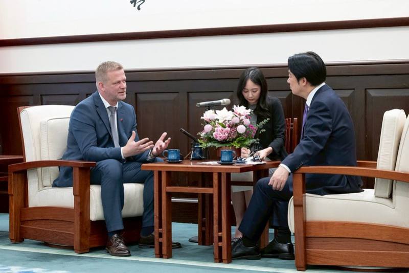 President Lai exchanges views with Member of the European Parliament Reinis Pozņaks.