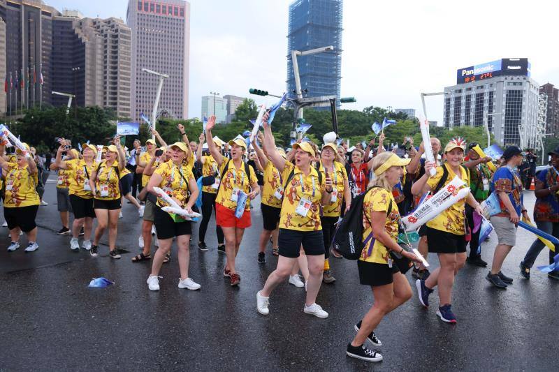 Athletes from various countries participated in the parade wearing distinctive costumes