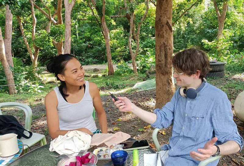 Aurélien Rossanino (right) interviews Indigenous singer Sauljaljui (left) during a visit with the songstress at her home in Taiwan's Pingtung County. Photo courtesy of Aurélien Rossanino