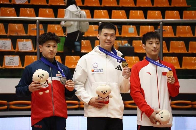Taiwanese gymnast Tang Chia-hung (center). Photo courtesy of the Chinese Taipei Gymnastics Association