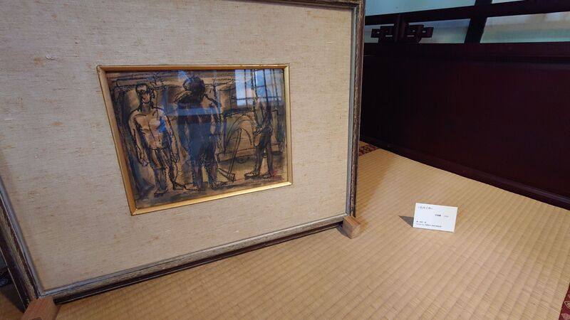 已故畫家洪瑞麟18幅礦工系列作品2日起於嘉義縣新港鄉培桂堂展出。圖為陳設於臥室的畫作「坑內工作」