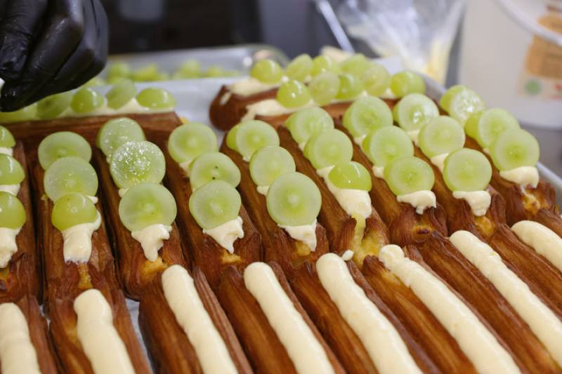 These grape and cheese croissants cater to the Taiwanese taste for sweet pastries with generous fillings.​​