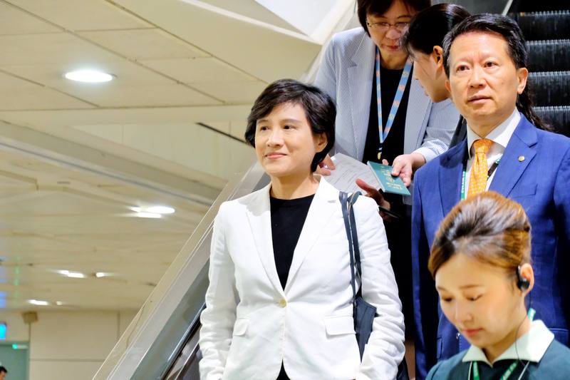 Vice Premier Cheng Li-chiun (first left) arrives at Taiwan Taoyuan International Airport on Sunday. CNA photo Aug. 3, 2025