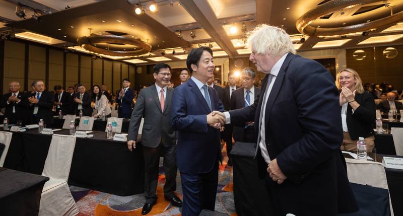 President Lai shakes hands with former United Kingdom Prime Minister Boris Johnson.
