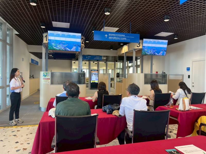 Visiting representatives from cruises company attend a presentation given