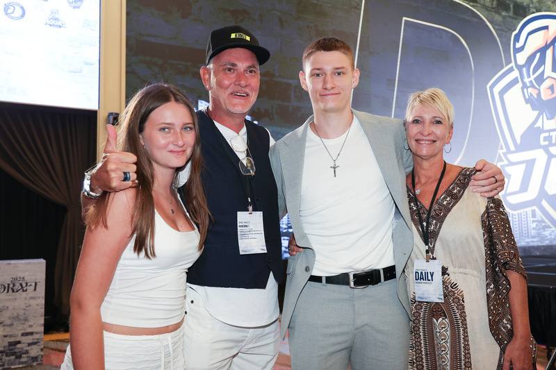 Jonathan Matthew Smith (3rd from left) poses with his family in Taipei Monday. CNA photo Aug. 11, 2025