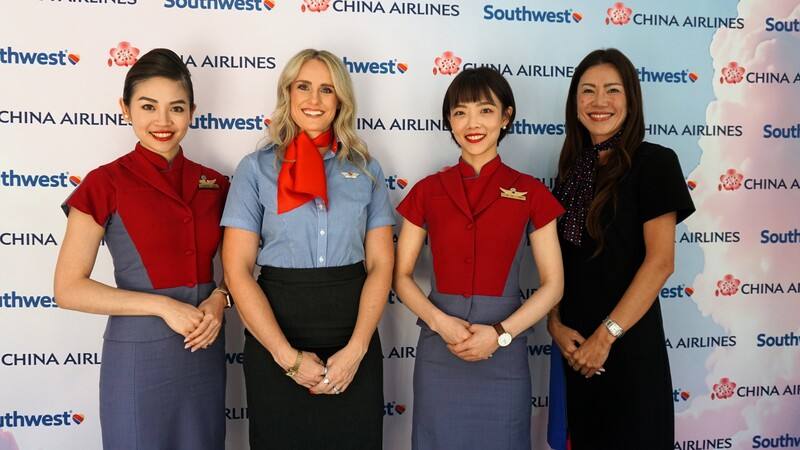 Flights attendants from China Airlines and U.S.-based Southwest Airlines pose for a group picture during a joint press conference held in Long Beach, California on Monday. CNA photo Aug. 18. 2025