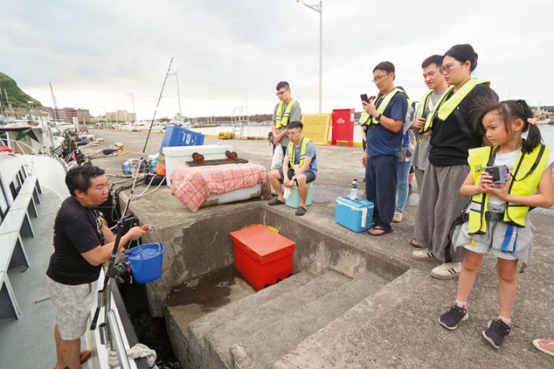 Ryron Chen, skipper of the Hualun, offers fishing instruction to novices. He stresses that recreational fishing is not just for experts, but is open to families and to women and girls.​​