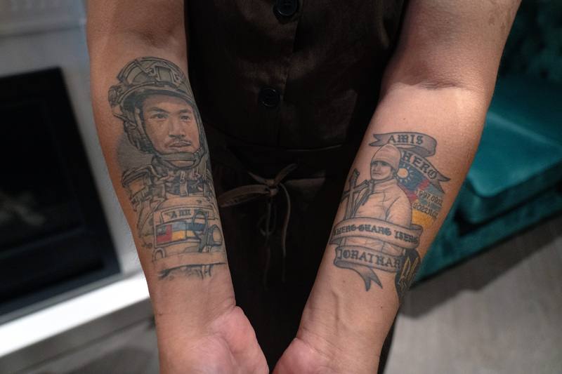 Tattoos on Su Yu-jou’s arms. CNA photo Aug. 25, 2025