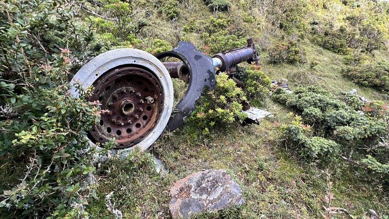 The rusted engine was found at the Sancha Mountain plane crash site in southern Taiwan. CNA photo, Sept. 10, 2025