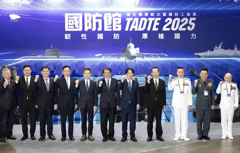 President Lai Ching-te (fifth right), with National Security Council Secretary-General Joseph Wu (fourth left) and Defense Minister Wellington Koo (fourth right), visits the 2025 Taipei Aerospace & Defense Technology Exhibition in Taipei on Friday. CNA ph