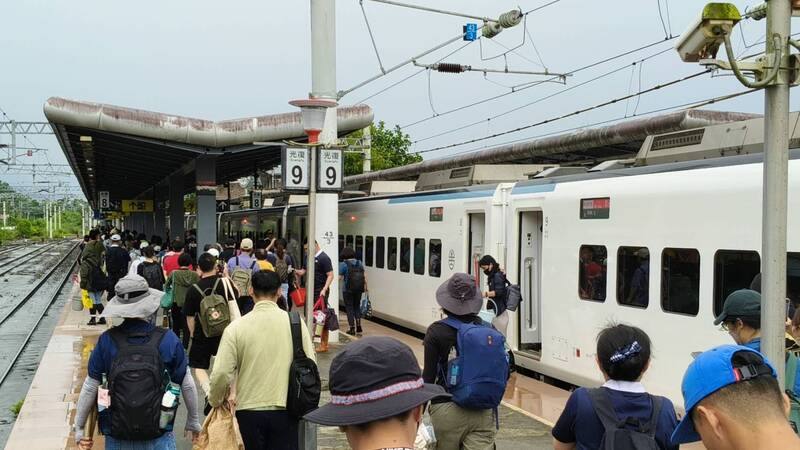 Volunteers gathered at Taiwan Railway's Guangfu Station in Hualien on Friday to help floods-hit local residents clean up their homes. CNA photo Sept. 26, 2025