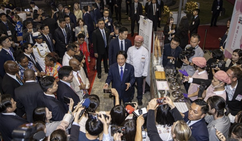 President Lai Ching-te (center) speaks to the media while attending the National Day reception in Taipei on Friday. CNA photo Oct. 10, 2025