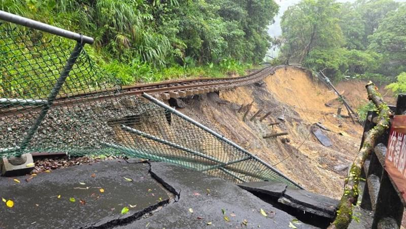 A section of the Pingxi Line railway track was damaged by heavy rain in northern Taiwan on Friday. Photo courtesy of a private contributor