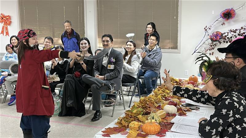 Costume contest participants showcase their creativity and festive spirit.