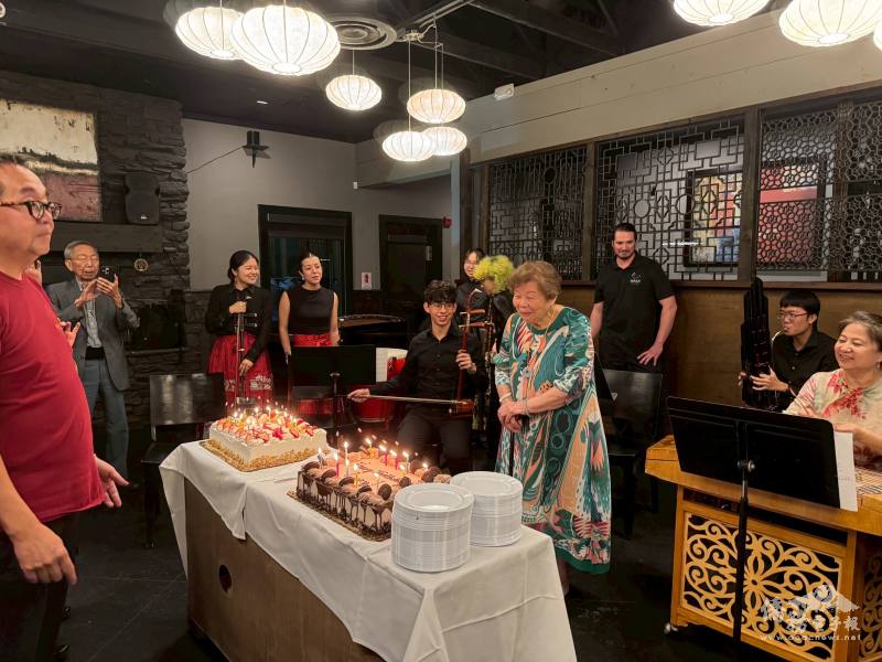 Dr. Lucy Ho makes a wish in front of her birthday cake by Liang Yu Hsia.