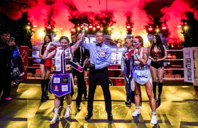 台灣女子職業拳擊好手吳沛儀（前左）15日成功擊敗澳洲勁敵，奪得WBO Pacific Title的冠軍腰帶，也讓自己的世界排名闖進前10。（肯將拳擊提供）