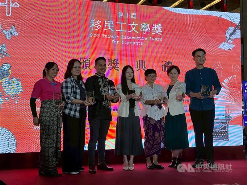 Winners of the 10th Taiwan Literature Award for Migrants smile for a photo during an award ceremony held at Taipei Main Station on Sunday. CNA photo Nov. 23, 2025