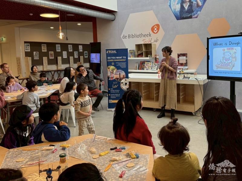Jiani Li introduces dough figurine art to the students.