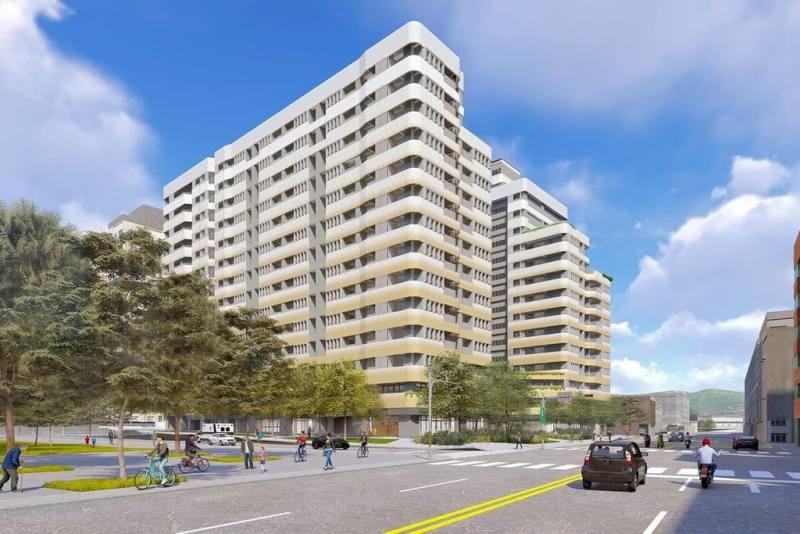 國家住都中心表示，「稻香安居」規劃興建兩棟地上14層、地下3層建物，提供468戶社宅及8間店鋪空間，建築外觀以淺灰為主色調，輔以亮黃色及棕色線條裝飾，預計2029年竣工。圖為完工模擬圖。（國家住都中心提供）