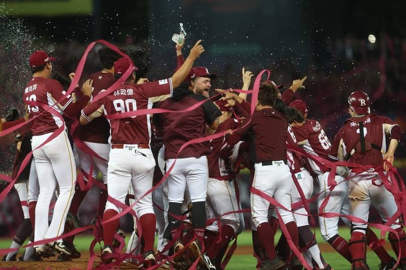 Players of the Rakuten Monkeys celebrate after winning the 2025 CPBL championship in Taichung in October. CNA photo Oct. 27, 2025