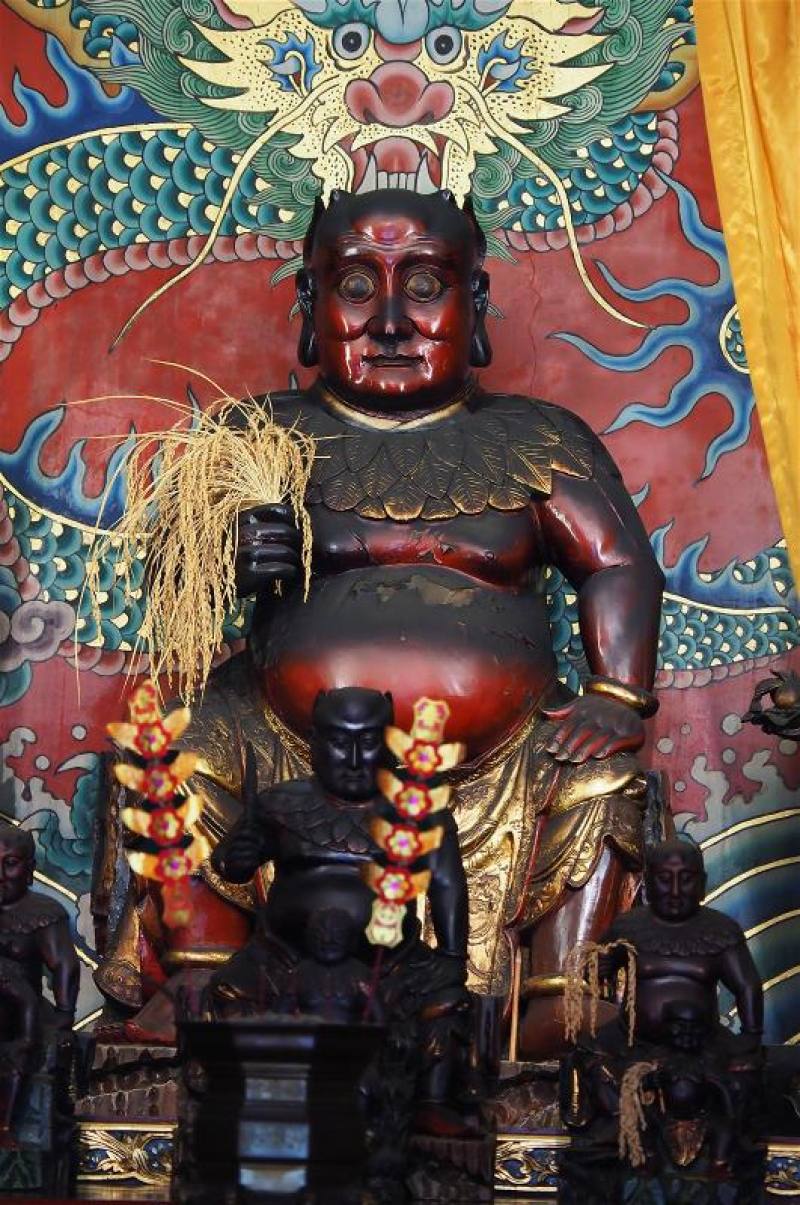 神農大帝的神像，多是手持一把穀物或禾草