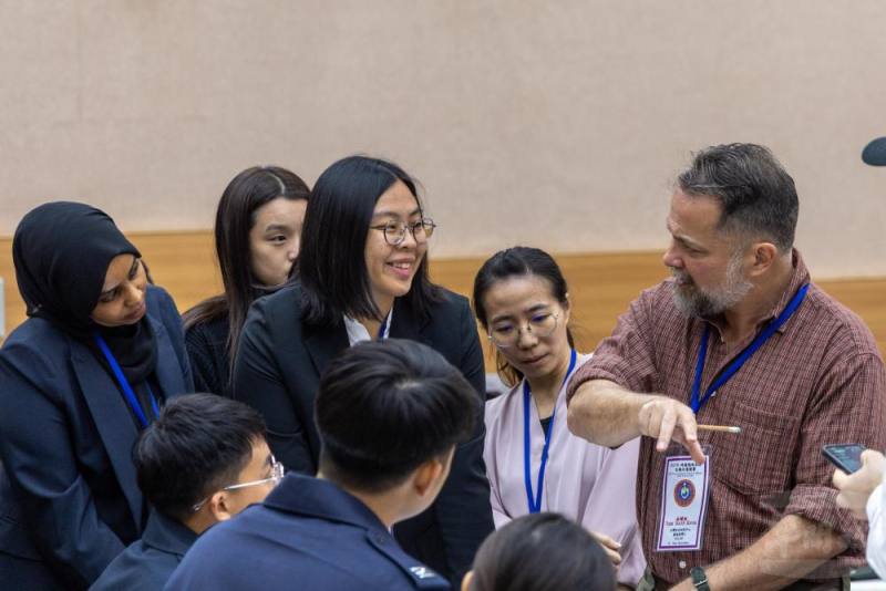 參賽者分組推演。（青年日報提供）