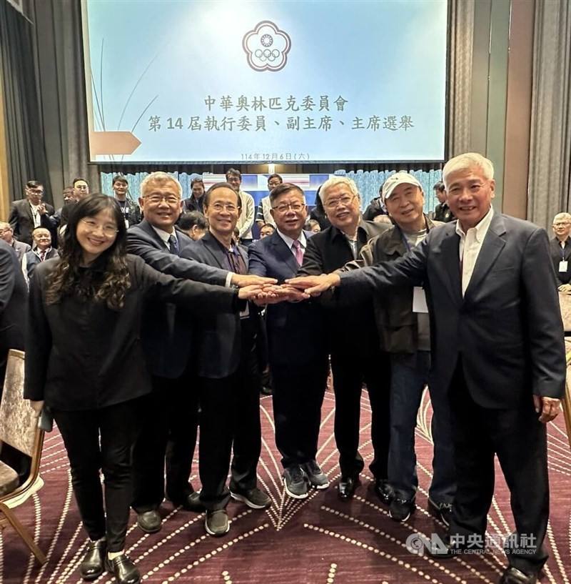 Tsai Chia-fu (center) and Chen Mei-yen (far left) pose with other elected committee members on Saturday. CNA photo Dec. 6, 2025