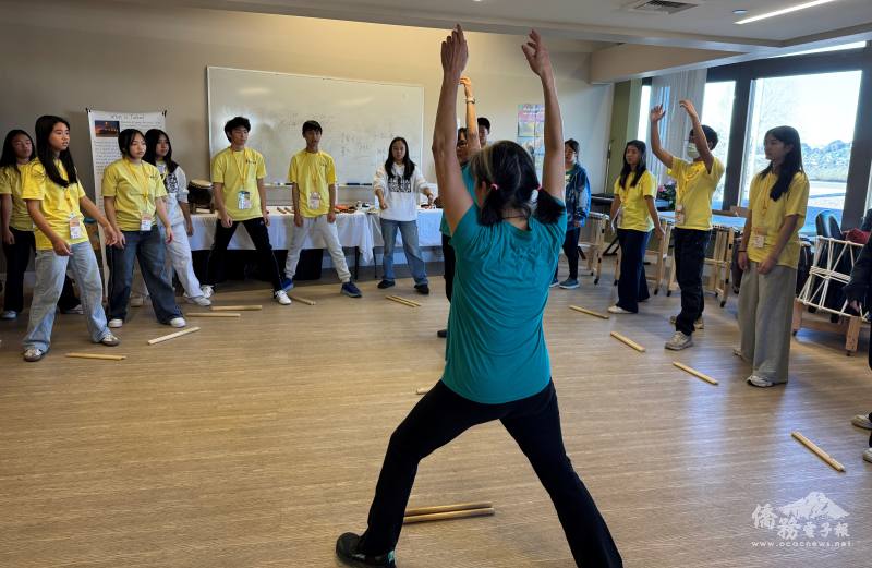 FASCA-SD members learn how to hold and maneuver Bachi Sticks first before playing Taiko.