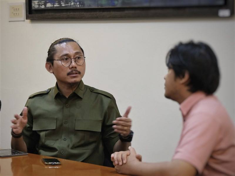 PBHI head Julius Ibrani speaks with CNA during an interview in Taipei. CNA photo on Dec. 11.