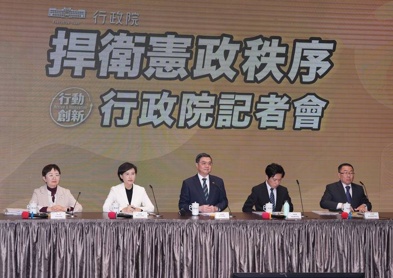 Premier Cho Jung-tai (center) holds a news conference on Monday to announce his decision not to countersign amendments to a revenue-sharing law passed by the opposition-controlled Legislature. CNA photo Dec. 15, 2025