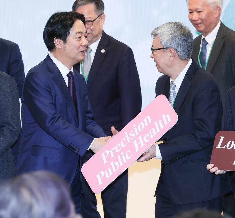 President Lai Ching-te (left) greets former Vice President Chen Chien-jen (right) on the Wednesday event in Taipei. CNA photo Dec. 17, 2025