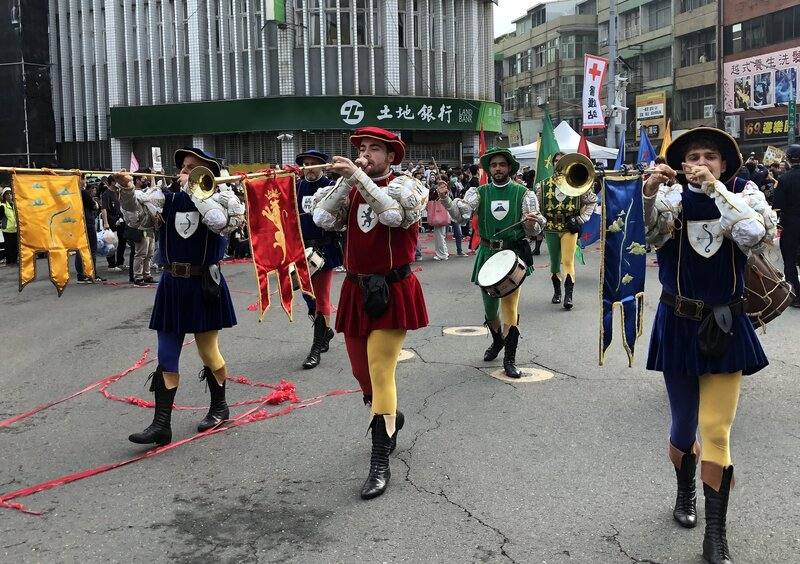 Members of Italy's “Storici Sbandieratori delle Contrade di Cori" (Historical Flag-wavers of the Contrade from Cori) perform their marching band piece with an European historical flair in Chiayi City on Saturday. CNA photo Dec. 20, 2025