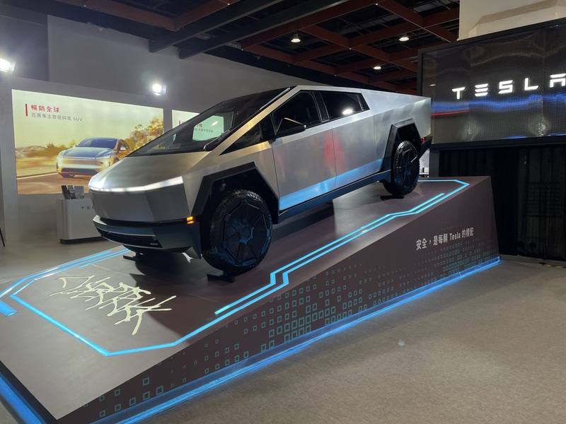Tesla's all-electric pickup truck, the Cybertruck, is placed at the Taipei Auto Show's venue on Tuesday. CNA photo Dec. 30, 2025
