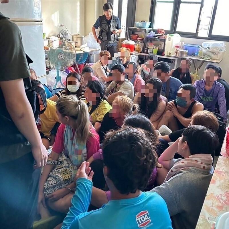 National Immigration Agency (NIA) officials arrest foreign nationals working illegally in Taiwan, allegedly housed by a man, surnamed Cheng, in residential properties under his name. Photo courtesy of the NIA