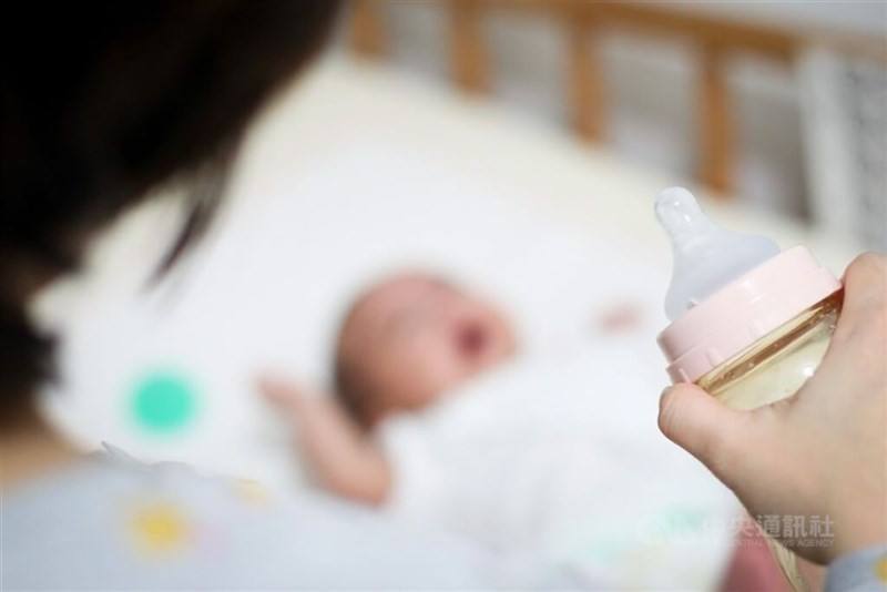 A newborn gets ready to be fed in this CNA file photo for illustrative purpose