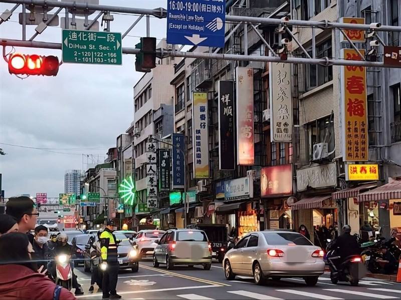 A police officer directs traffic around Taipei's Dihua Street. Photo courtesy of local authorities