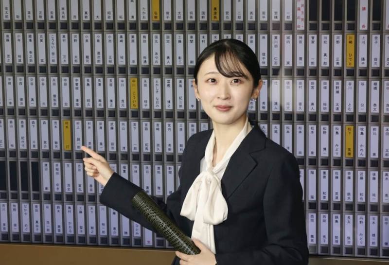 日本自民黨籍議員村木汀18日上午在國會亮相。（共同社）