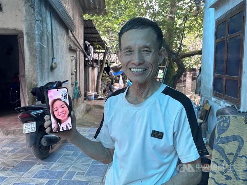Văn appears happy as his daughter calls to offer New Year greetings. CNA photo Feb. 20, 2026