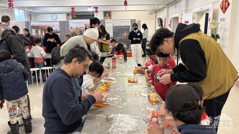 參與活動家長及學童專注手作燈籠