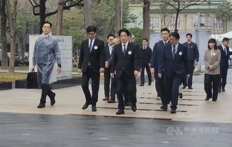 President Lai Ching-te (front center) walks with Kaohsiung Mayor Chen Chi-mai (front second left) to Kaohsiung 228 Peace Memorial Park on Saturday. CNA photo Feb. 28, 2026