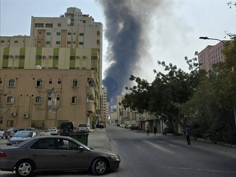 Smoke rises from a street in Bahrain after an Iranian missile and drone attack, part of Tehran’s retaliation following weekend airstrikes on Iran by the United States and Israel. Photo courtesy of a source identified only by the surname P