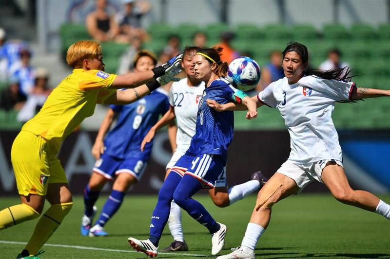 Taiwanese goalkeeper Wang Yu-ting (in yellow) defends against Japanese players at the 2026 Asian Football Confederation Women's Asian Cup Group C opener in Australia on Wednesday. Photo courtesy of Chinese Taipei Football Association