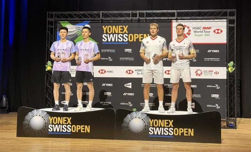 Taiwan's twin brothers Lee Fang-jen and Lee Fang-chih (left) defeated Denmark's Daniel Lundgaard and Mads Vestergaard (right) 21-18, 21-13 to claim the men's doubles title at the BWF Super 300 Swiss Open in Basel on Sunday. (Photo courtesy of Coach Liu Ch