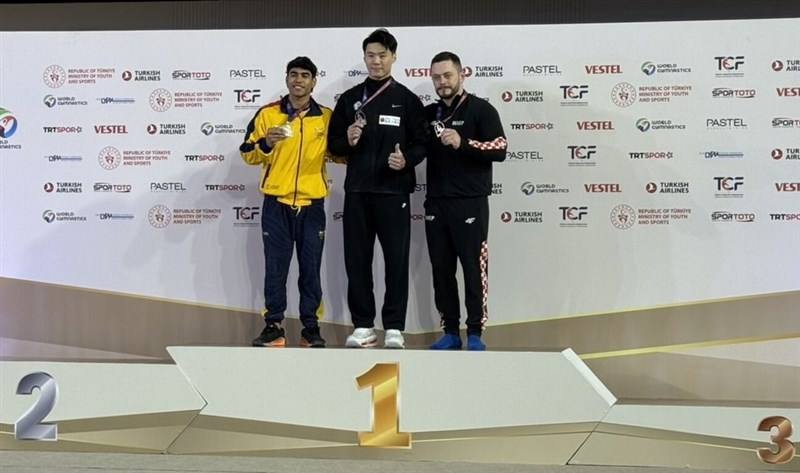 Taiwanese gymnast Tang Chia-hung (center) poses with his gold medal on the podium alongside silver and bronze medalists in Antalya, Turkey, on Sunday. Photo courtesy of Huang Bo-rui