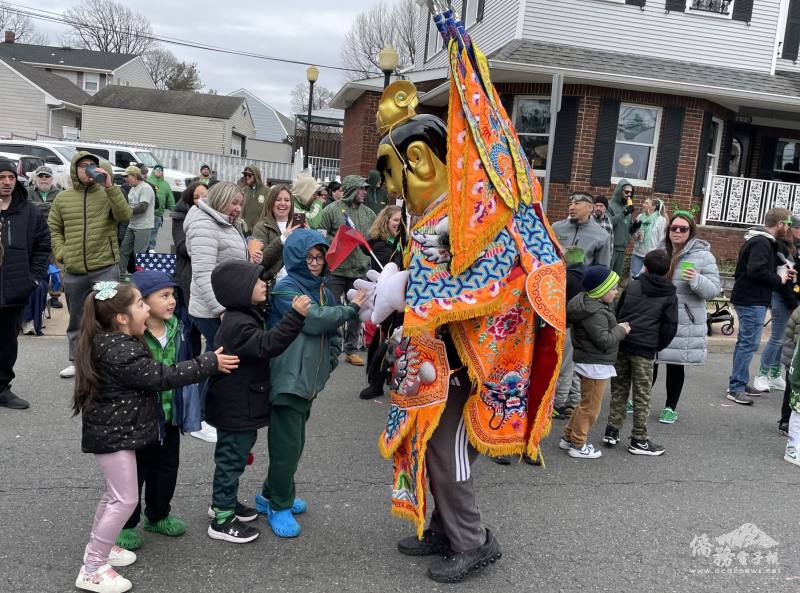 FASCA Princeton’s San Tai Zi (三太子) costumes waved, shook hands, and high-fived children, drawing smiles and applause from spectators.
