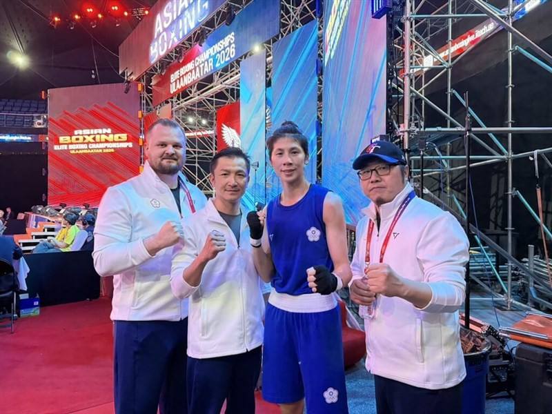 Taiwanese boxer Lin Yu-ting (second right) poses after winning a match at the 2026 Asian Boxing Elite Championships in Mongolia on Friday. Photo courtesy of Chinese Taipei Boxing Association