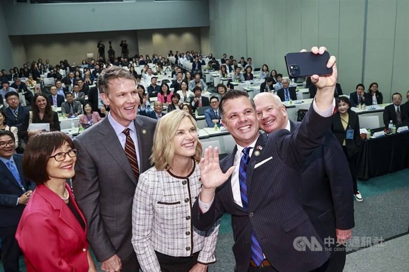 United States Representative Zach Nunn (second from right) poses with other attendees at a forum in Taipei on Tuesday.